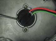 could occur to the motor. 7. Use a flathead screwdriver to pry around the edge of the speed sensor.