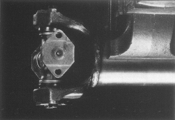 Disassembly of Driveshaft Figure 28 Trunnion and End Yoke Free the trunnion from the end yoke by tilting the trunnion and collapsing the driveshaft, see Figure 28