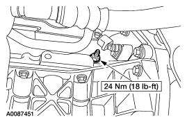 Screw in special tool 303-574 and make sure that the crankshaft is resting against the special tool.