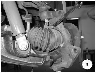 Steering Knuckle Removal a) Starting on the passenger side of the vehicle, remove the wheel from the steering knuckle.