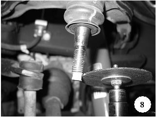 ! Another known way to remove the lower ball joint is to use a large hammer and forcefully strike the lower ball joint boss. This striking action will usually free the ball joint with one swing.
