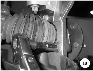Be very cautious while lifting the lower control arm because it is under extreme load.
