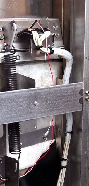 The element wires are attached to the new element support bracket in four places with wire ties.