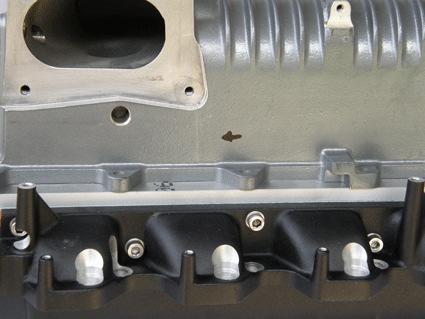 On the front of the Tork Tech lower manifold there are two o-ringed coolant fittings that need to be inserted into the