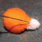 Ears: Lay orang wool into small triangls.