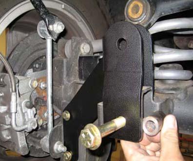 REQUIRED TOOLS: Basic mechanics' hand tools Vehicle Hoist 5/16 drill bit Jack Stands Floor Jacks Rear Installation: 1.