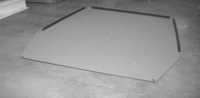 Install Angles on Floor: 1) Place floor P/N 21268 on a table or box with textured side up.