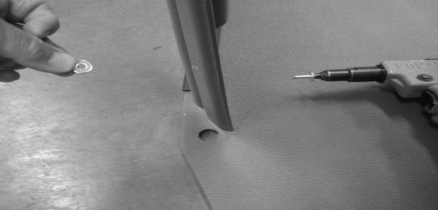 Match holes in bracket with holes in floor. Tighten screws & nuts using T-30 Torx bit & 1/2 (.