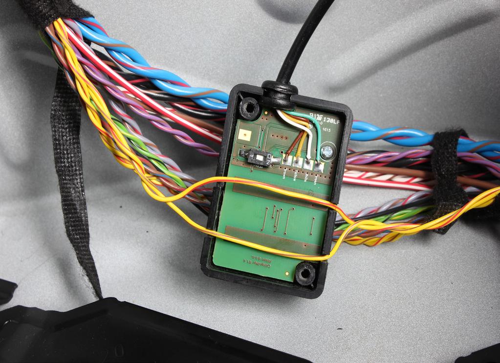 IMPORTANT: carefully separate the marked YELLOW-RED and YELLOW-BROWN wires from main trunk harness, unscrew the CAN sniffer s cover, lead the yellow-red and yellow-brown wires through the CAN sniffer