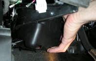 Re-attach Tailgate Support Cables and close Tailgate. Figure 11. FIGURE 11 31. Remove M-BEC cover under the dashboard by popping it off with hands. Figure 14. FIGURE 14 29.