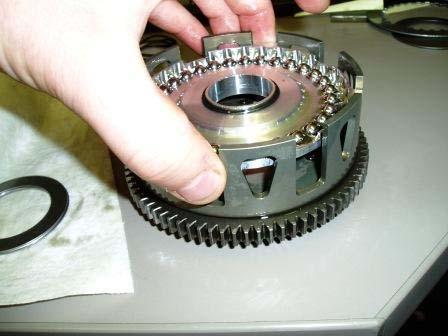 b. Install the spring loaded ball plate, with all the balls, into the cl