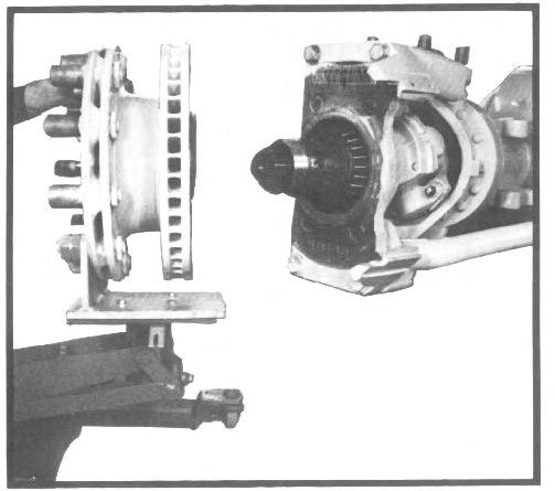 FIG. 12 B. WHEEL BEARING AND HUB ASSEMBLY If hub seal is being replaced, apply gasket compound to outer edge of hub seal and install seal into torque plate with a suitable tool.