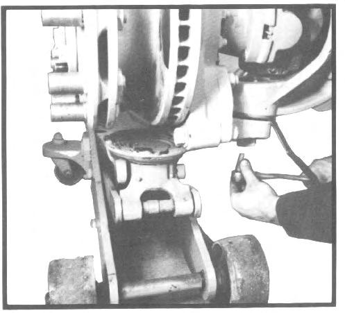 A. Wheel Bearing Adjustment Ill. AXLE ADJUSTMENT Note: Brake service is covered in the Disc Brake Service, Section IX. Note: A special wrench is available for adjustment of wheel bearing nuts.