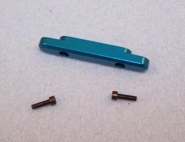 A15) Remove the blue hinge pin brace (ASC 9665) and two 2-56 X 5/16 cap head screws (6055) from bag A.