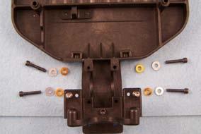transmission and select the proper shims from the bag of shims (5700). Here we use gold.
