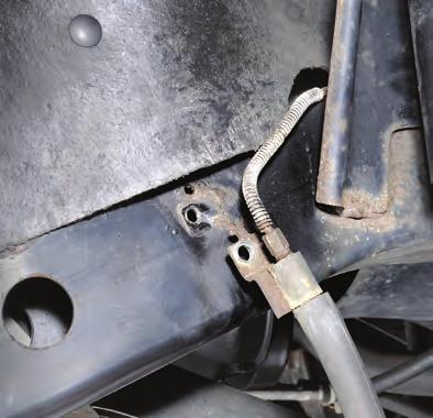 Disconnect brake line bracket