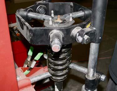 Use caution when using coil spring compressors. a.