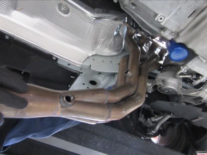 Position the header against the engine, once in position place the exhaust