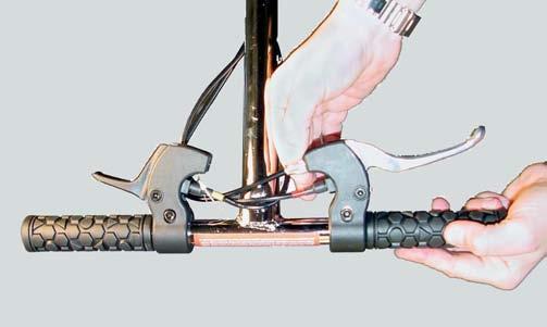 Figure 3 Figure 4 The design of the brake lever (mounted on the handlebar), provides another type of adjustment to the brake cable.