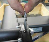 Align the two (2) pins, one (1) on each side, with the grooves on each side of the hitch