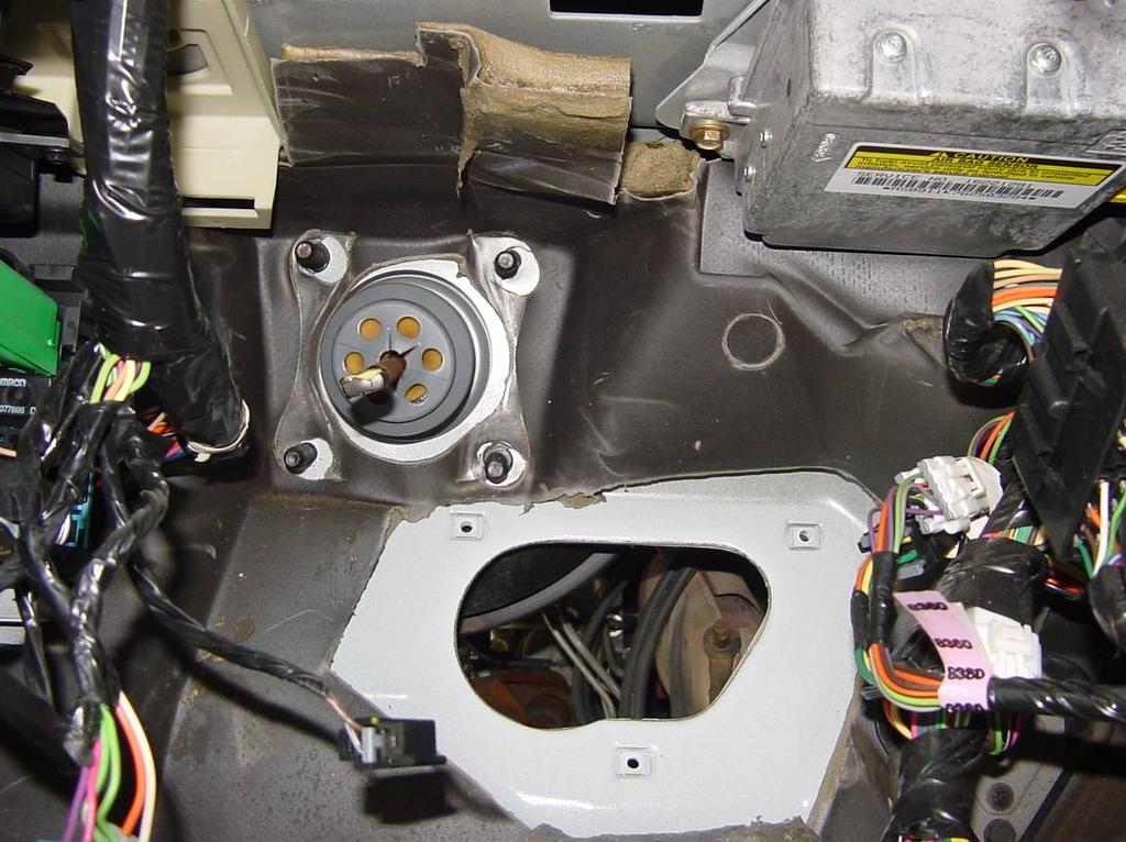 Figure 1 - Firewall with steering column and pedals removed 11. Using a 7mm deep socket, remove the 2 fasteners holding the under dash fuse panel (Convenience Center) to the firewall. 12.