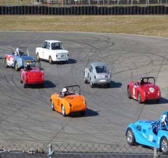 The small-bore race grid included Bug-eye Sprites, MGBs, a Triumph GT6,