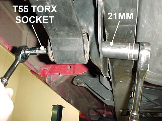 3) Use a T55 (Torx) socket and 21mm socket or wrench to loosen the bolts at both ends of