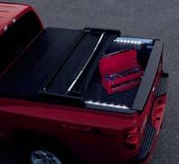 2 Hard Folding Tonneau Cover. Folding cover features a lightweight aluminum frame with structural foam panels that are rust- and corrosion-resistant.