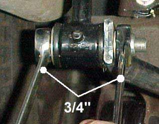 11) Use a 3/4" socket or wrench to tighten up the bolts holding the end links in place. Torque the hardware to 30 ft/lbs.