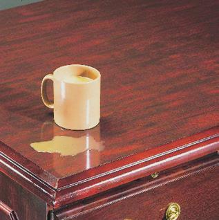 Solid wood mouldings and bases, mitred edges and swinging bail drawer pulls are true indications of traditional
