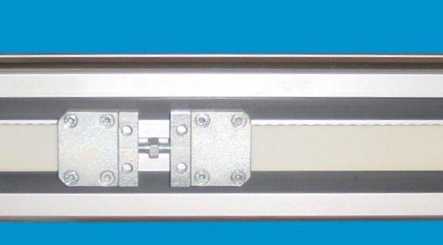 The clamp plate is composed of upper and lower portions. emove the SHCS (12) in order to remove the upper portion. 11 1 8 emove the old belt. Thread the new belt through the linear module.