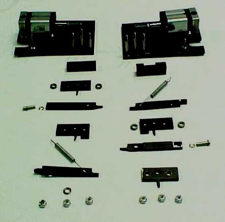 Pictured above is the B-size cutter blade assembly. The following information describes the changes needed to switch from the B to A-size and B to C-size cutter assemblies.