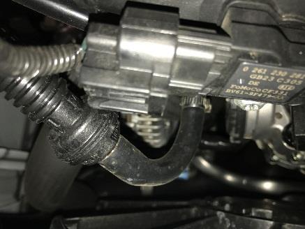 adapter and install two vacuum/boost fittings as shown. Apply thread sealant on threads before install.