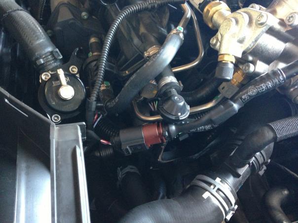 Pull the intake pipe out of the airflow meter (5) Unclip the recirculation pipe from the straps by lifting the tabs