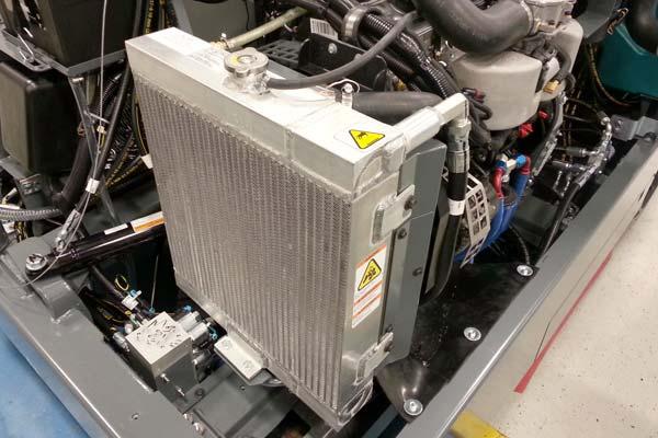 MAINTENANCE Check the radiator core exterior and hydraulic cooler fins for debris after every 100 hours of operation.