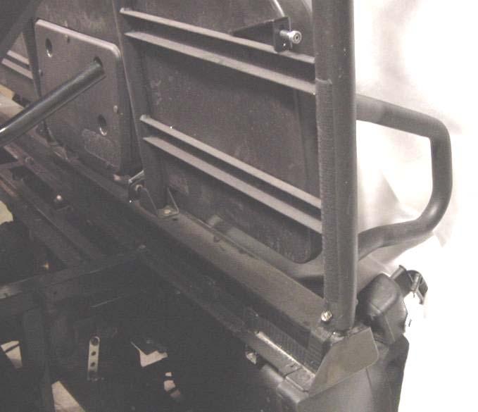 Install the first piece to the back side of the frame tubing from a (approximately the middle of the seat back support) to b (just above the bolt).