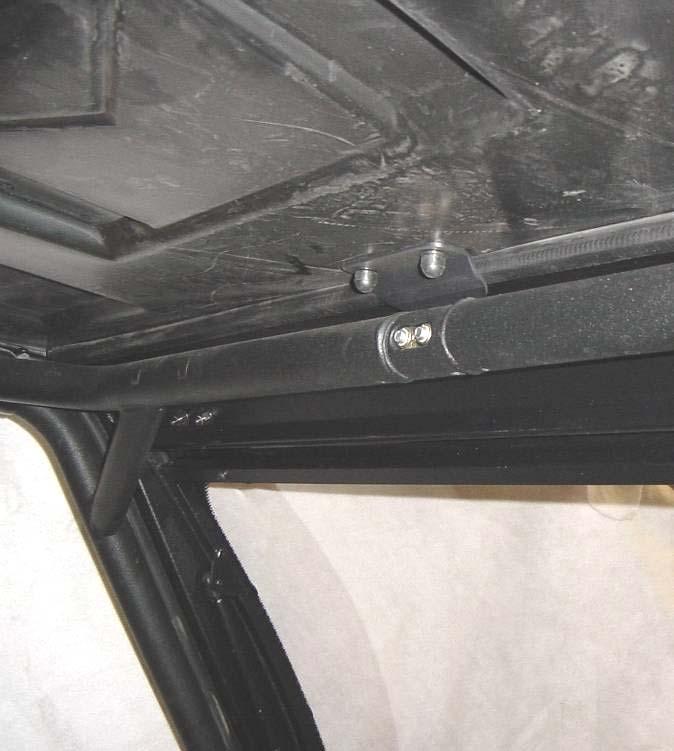 p. 13 of 25 4. ROOF 4.1 Per figures 4.1, 4.1.1, and 4.1.2, install the roof assembly oriented as shown with the bolt-on-bracket towards the front of the vehicle and the T handle receiver bracket towards the rear of the vehicle.