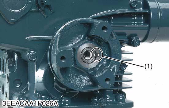 Fan Drive Pulley 1. Secure the flywheel to keep it from turning. 2. Remove the fan drive pulley screw. 3. Draw out the fan drive pulley with a puller.