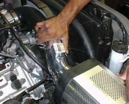 Figure 39 Once you inserted the throttle body end into the 90 degree elbow,