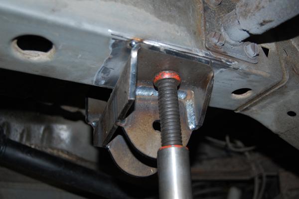 Rear Arms Installation Procedures 1. Remove muffler. It will have to be rotated or replaced later with a smaller unit to clear control arms. 2.