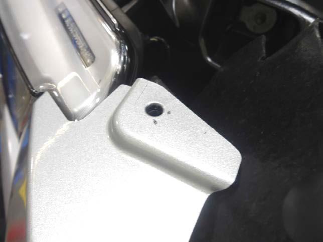 6. Remove factory bumper bolt see Figure 13.