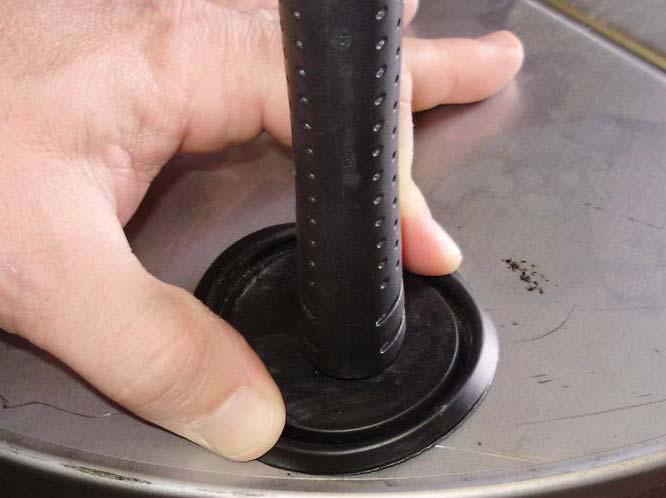 To insert 5871B8 cap plugs into bottom holes, pinch cap plug into place using index