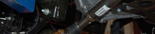 Remove the stock front upper sway bar links from the sway bar as shown in Photo 3 using a