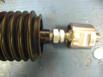With outer tie rod and boot assembled ont the tie rod, thread the