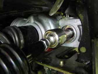 11. Install the inner tie rod end into the steering rack by first applying red locktie to the inner tie rod end.
