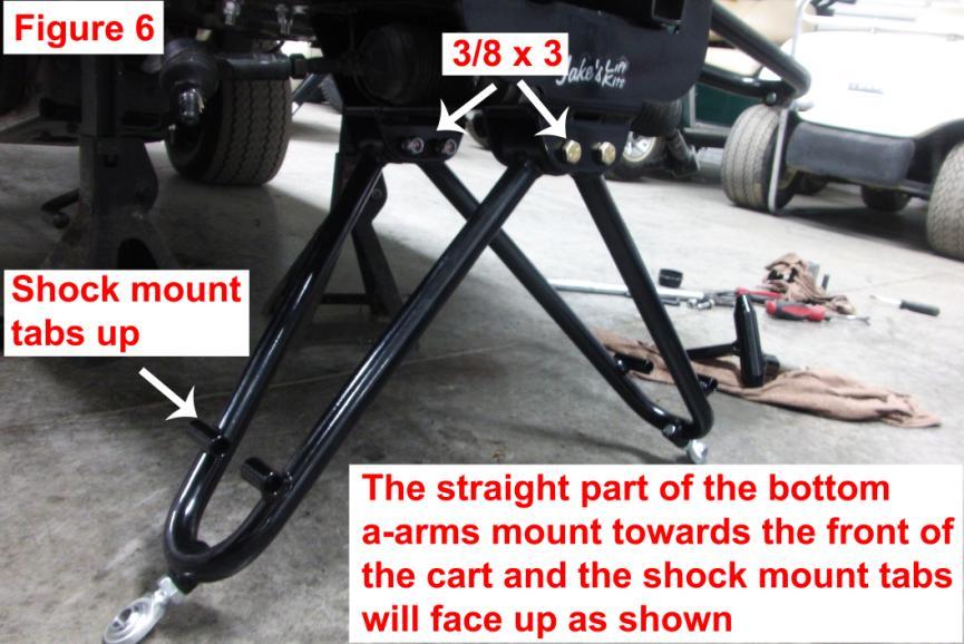 10. Using the stock bolts and supplied black metric washers install the new top A-arms (ITEMS F&G) to the stock a-arm location as shown in FIGURE 5. NOTE: The a-arms are side specific.