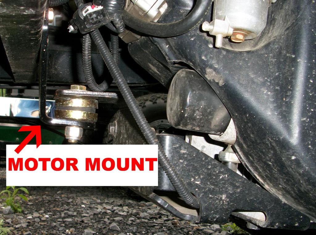 13. Using the supplied (or stock) motor mount bolt, stock washers, & stock retainers bolt the new