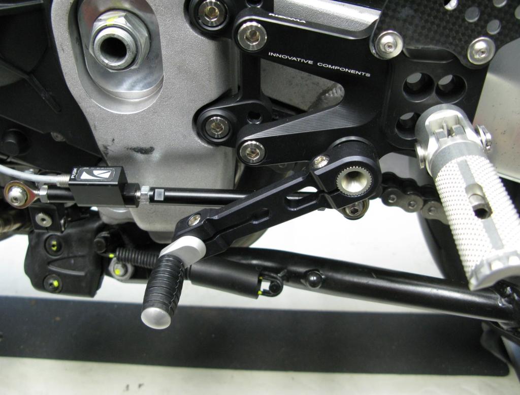 8. Now on the right side of the bike locate the speed sensor connector, located just inside the right side sub frame rail under the fuel tank.