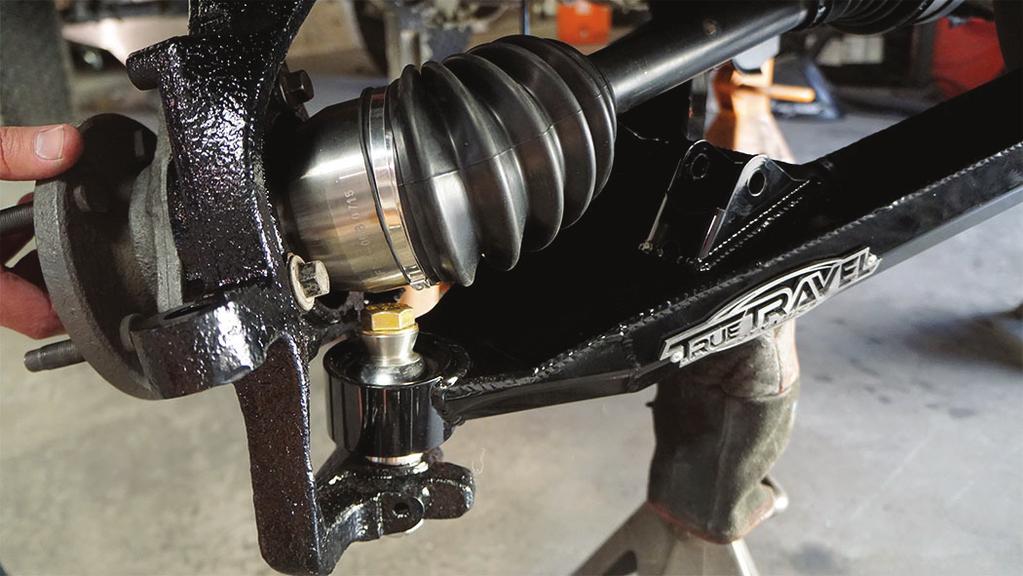 Then install the lower control arms using the factory hardware on the frame side and support it with a jack. If this is a 4WD kit, install the new extended axle PN# TTD-AS.