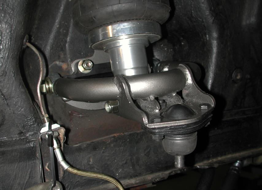 1. Bolt the Ball Joint to the Control Arm with the BALL JOINT SPACER between the Ball Joint and Control Arm.